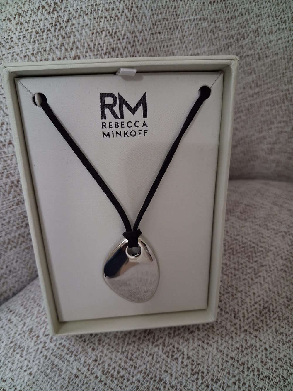 Rebecca Minkoff Polished Silver Pebble Pendant on Black Cord